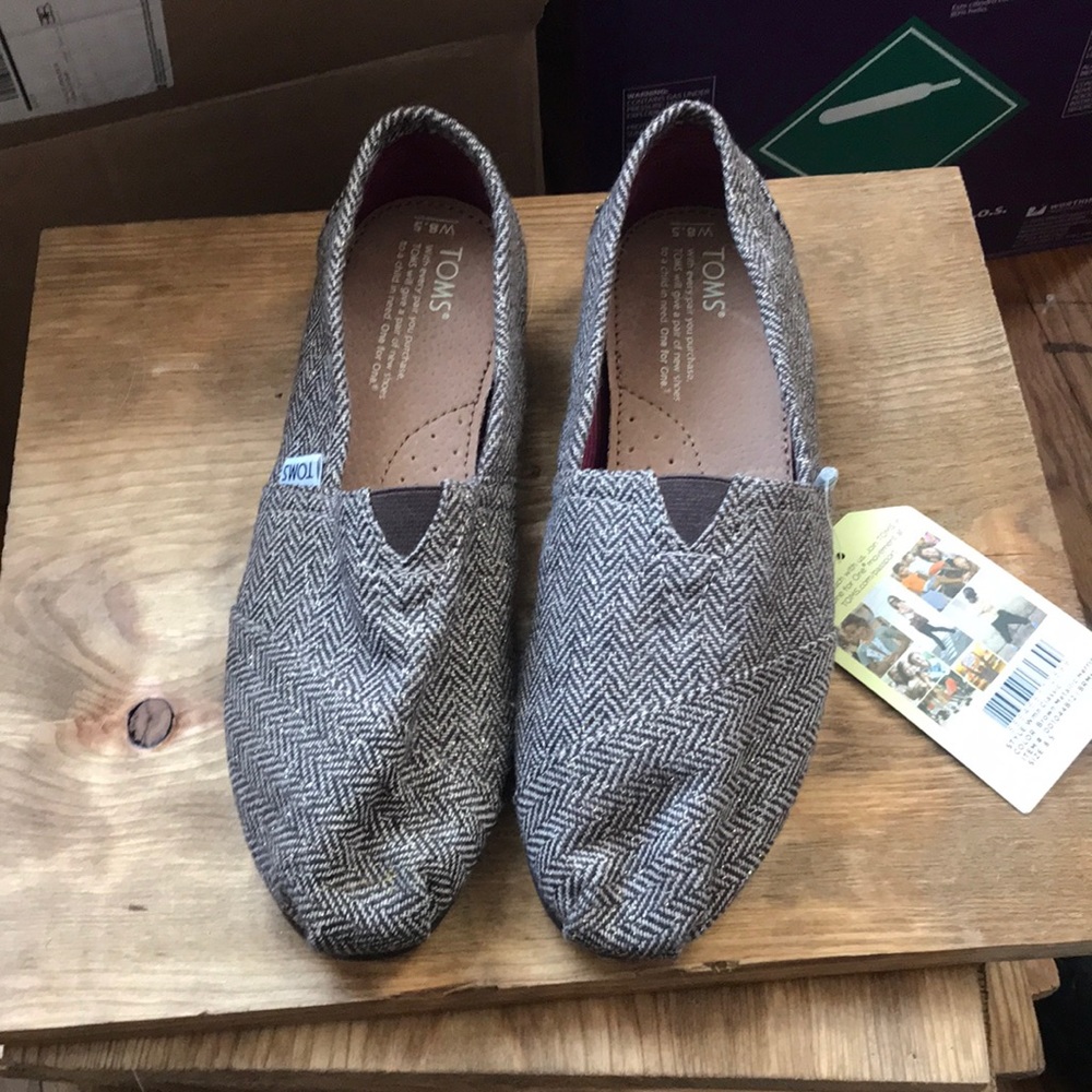 Toms size 8.5. New with tags on!